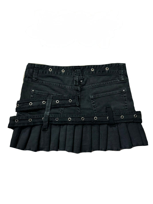 Pleated eyelet skirt with metal charms