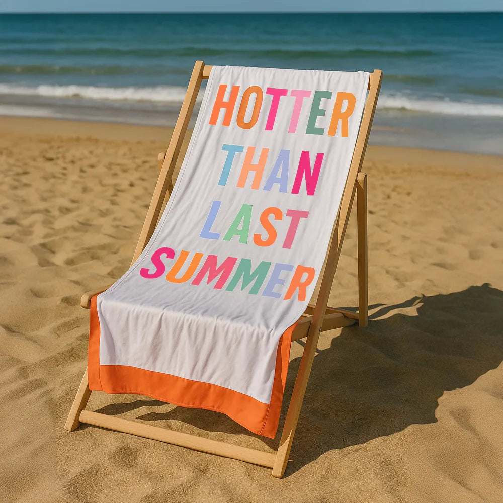 Beach towel "hotter than last summer"