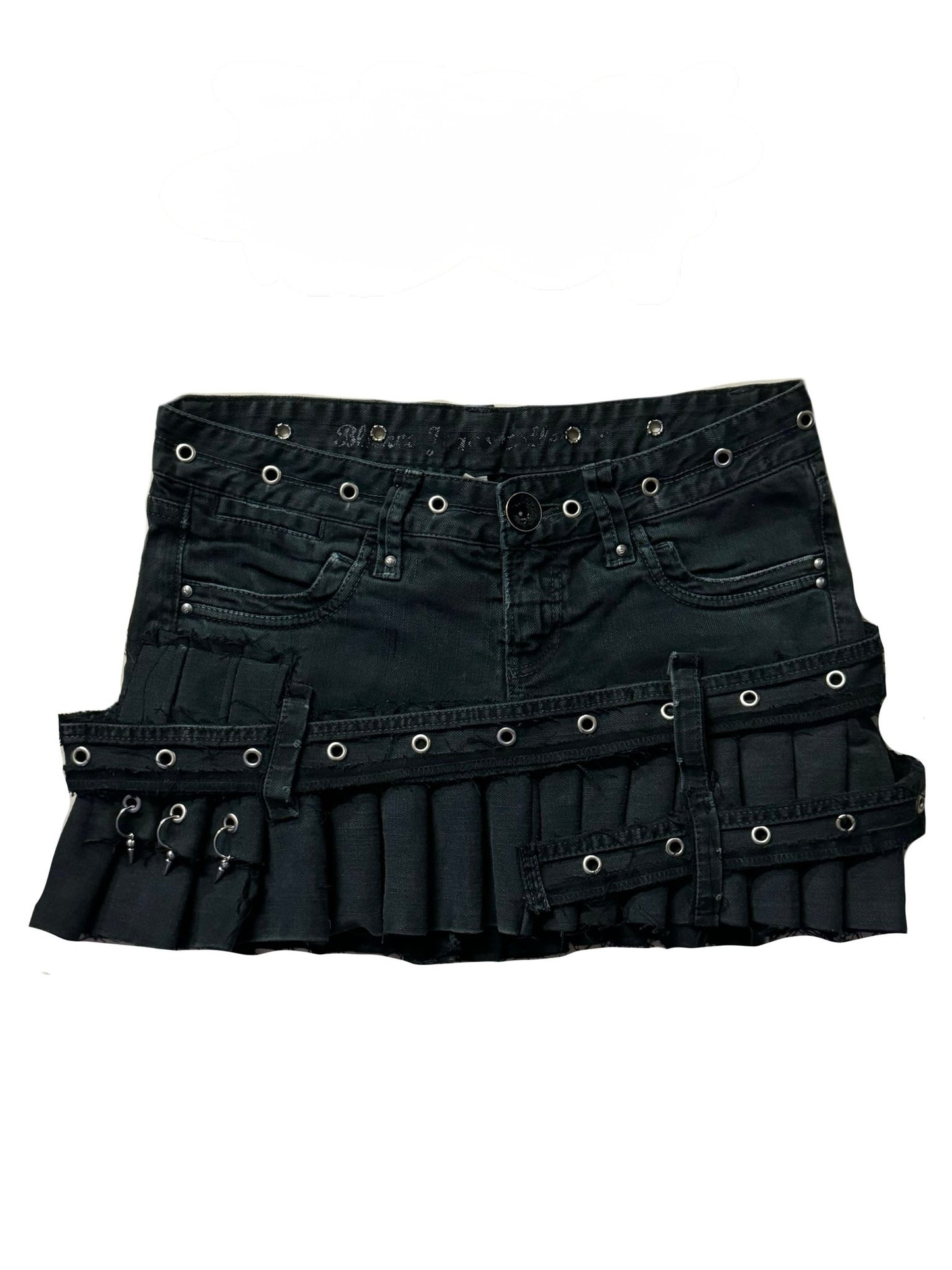 Pleated eyelet skirt with metal charms