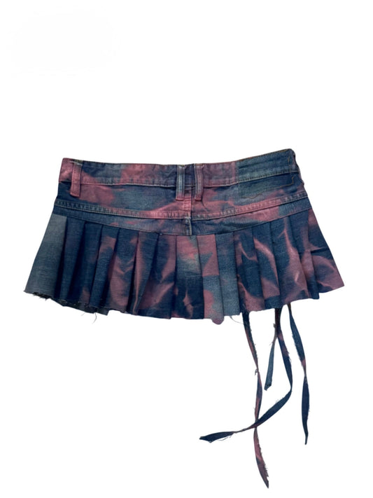 Pleated micro skirt with distressed hem